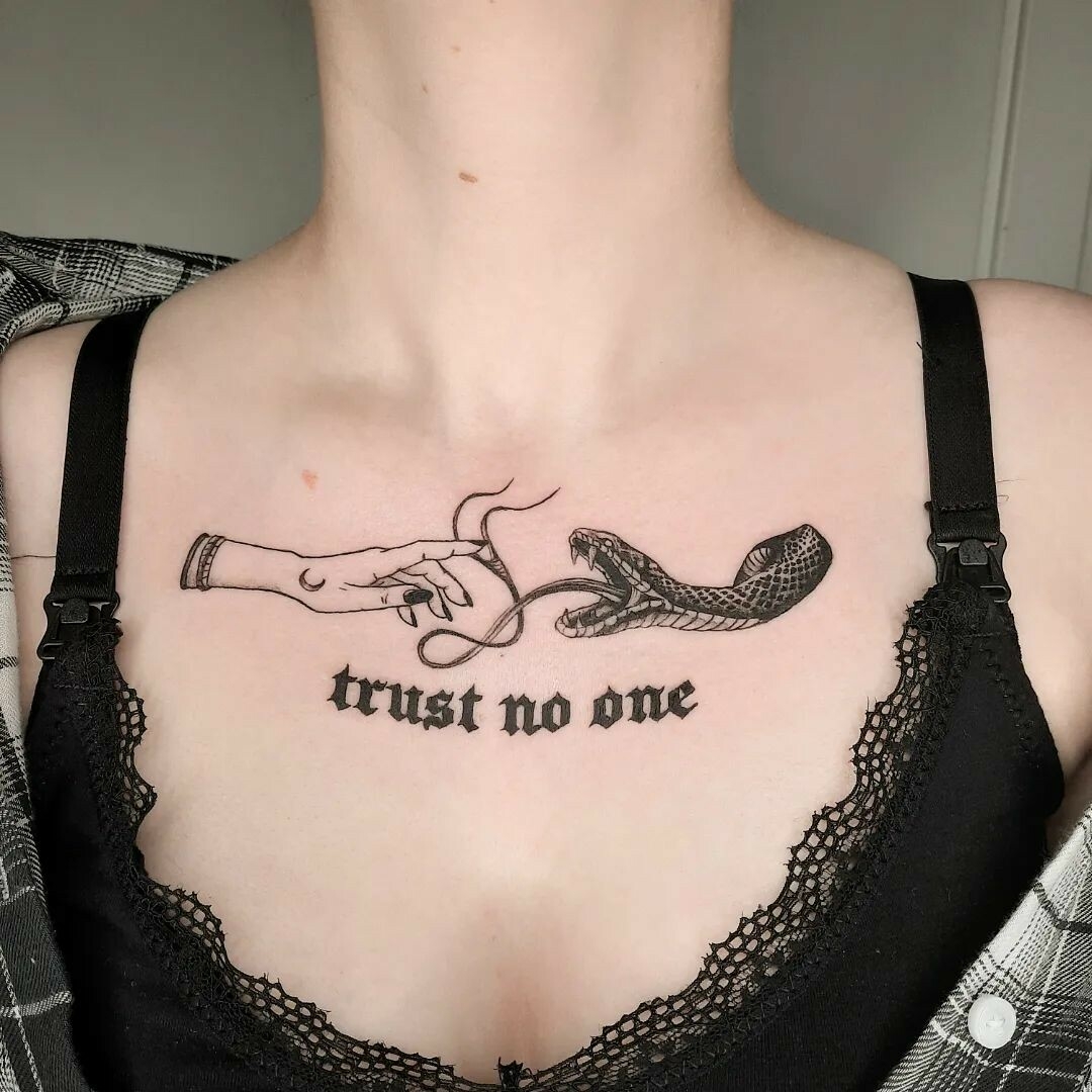 Female Trust No One Tattoo Meaning